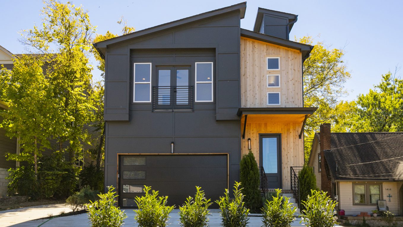 Gray modern two story house.